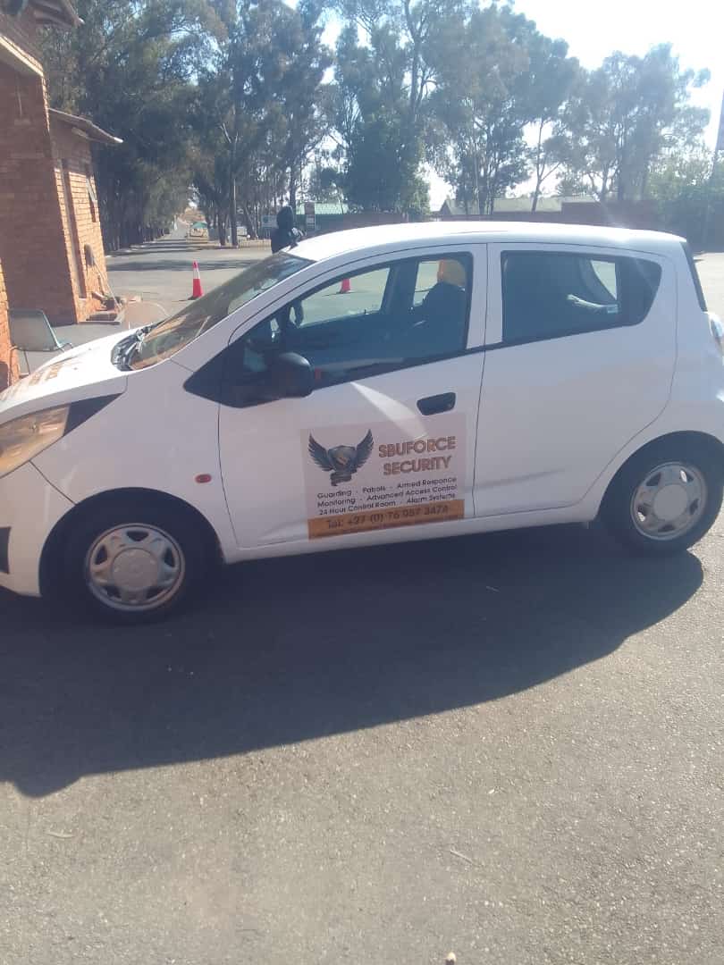 Marked SbuForce Security patrol vehicle